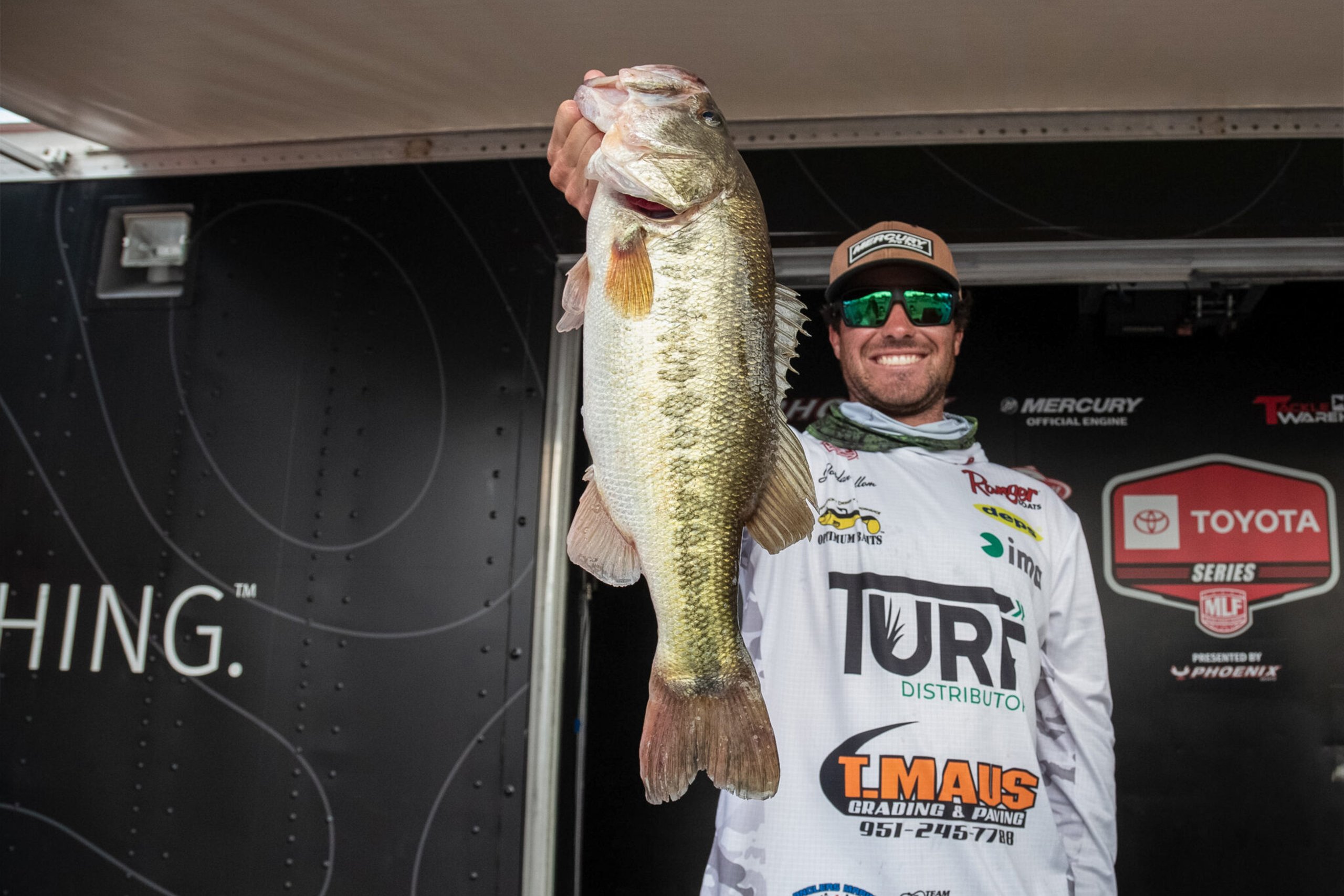 Jordan Collom holding a fish